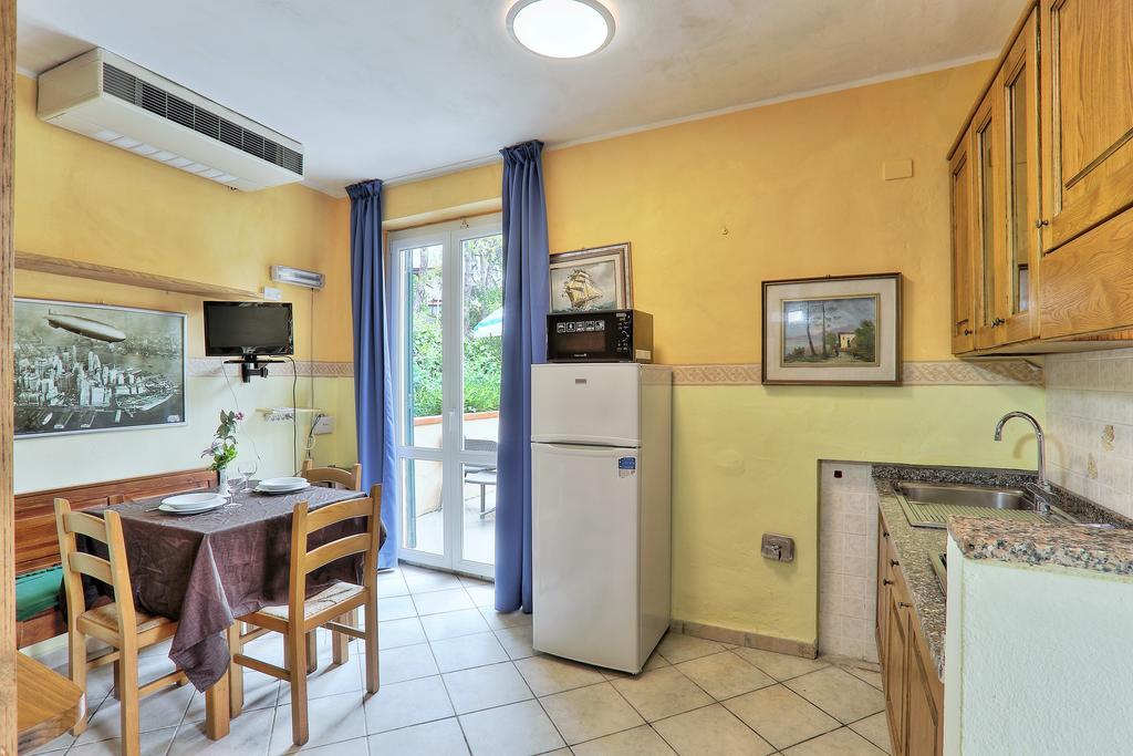 Residence Vacanza Mare マリーナ・ディ・カンポ 部屋 写真